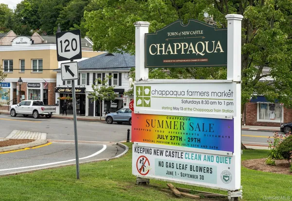 a view of a street sign under an umbrella
