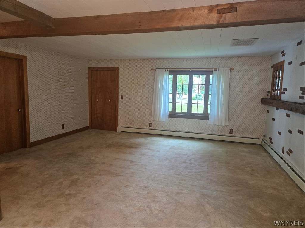 Living room (23 x 13) - large picture window, lots of natural sunlight