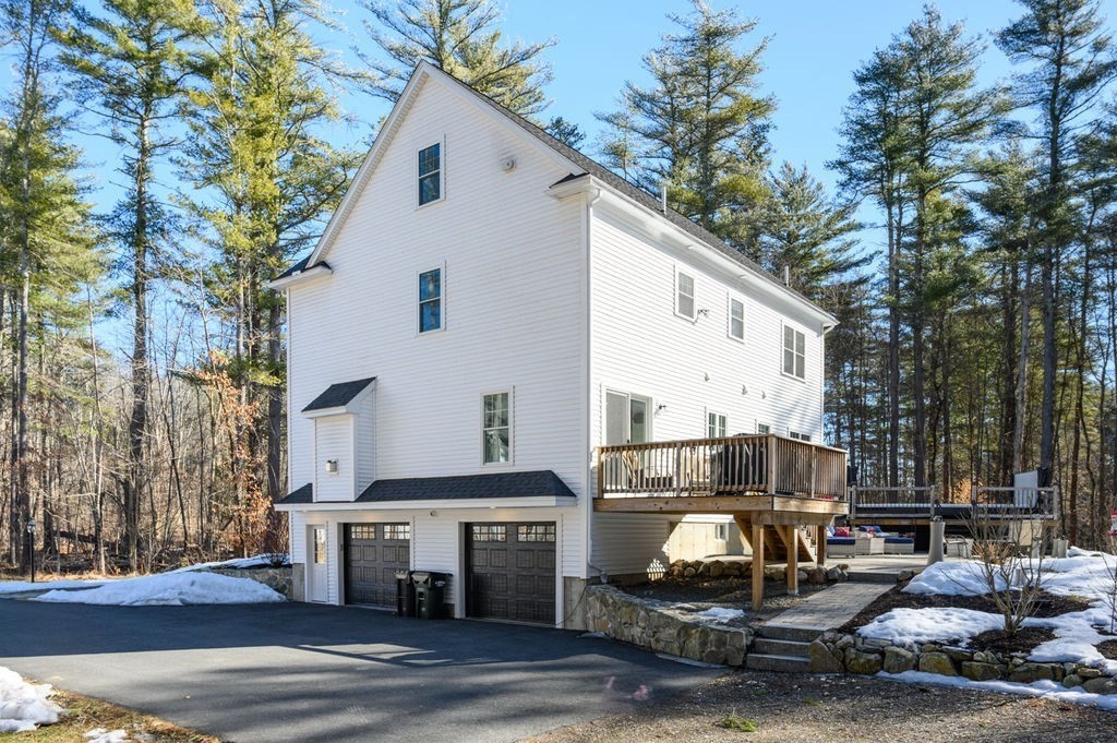 600 Wethersfield Street Rowley, MA 01969 - Photo 13 of 42 a view of a car park in front of house