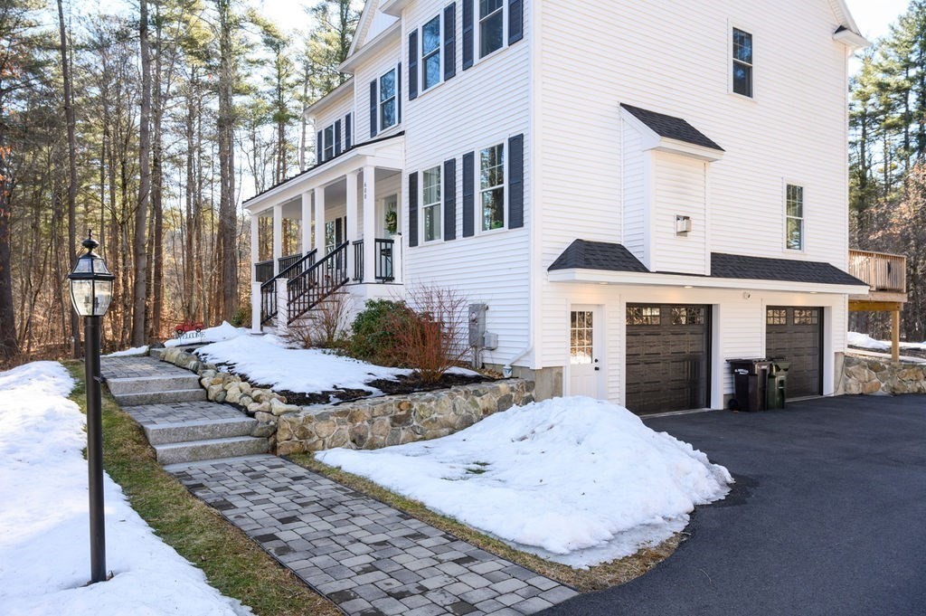 600 Wethersfield Street Rowley, MA 01969 - Photo 14 of 42 a view of a white house with iron fence