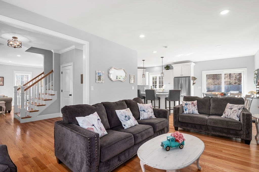 600 Wethersfield Street Rowley, MA 01969 - Photo 21 of 42 a living room with furniture and a wooden floor