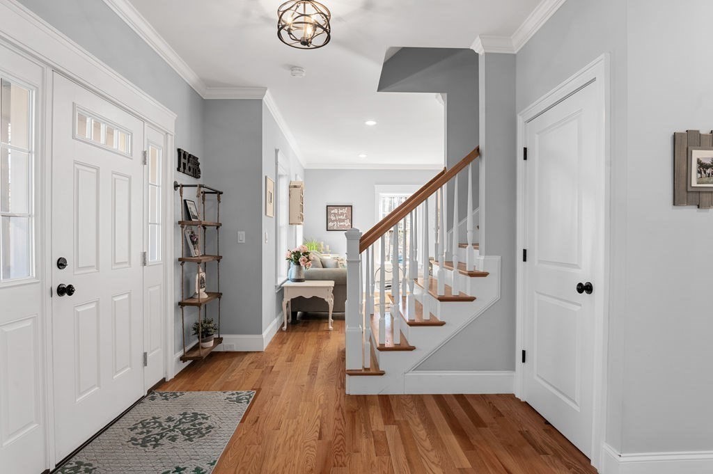 600 Wethersfield Street Rowley, MA 01969 - Photo 24 of 42 a view of entryway with wooden floor and stairs