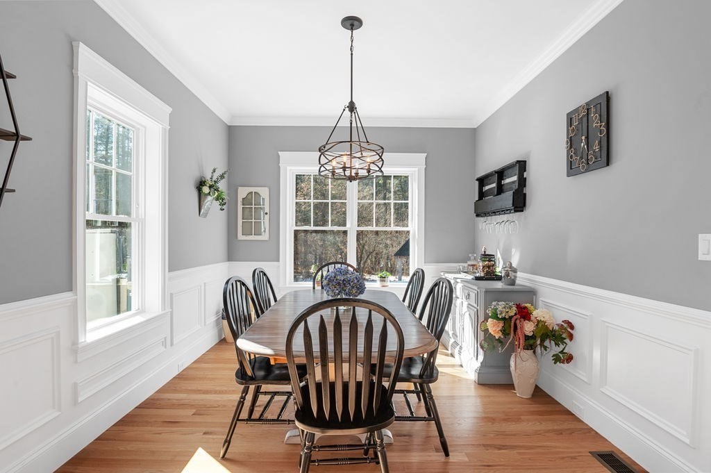 600 Wethersfield Street Rowley, MA 01969 - Photo 27 of 42 a view of a dining room with furniture window and wooden floor