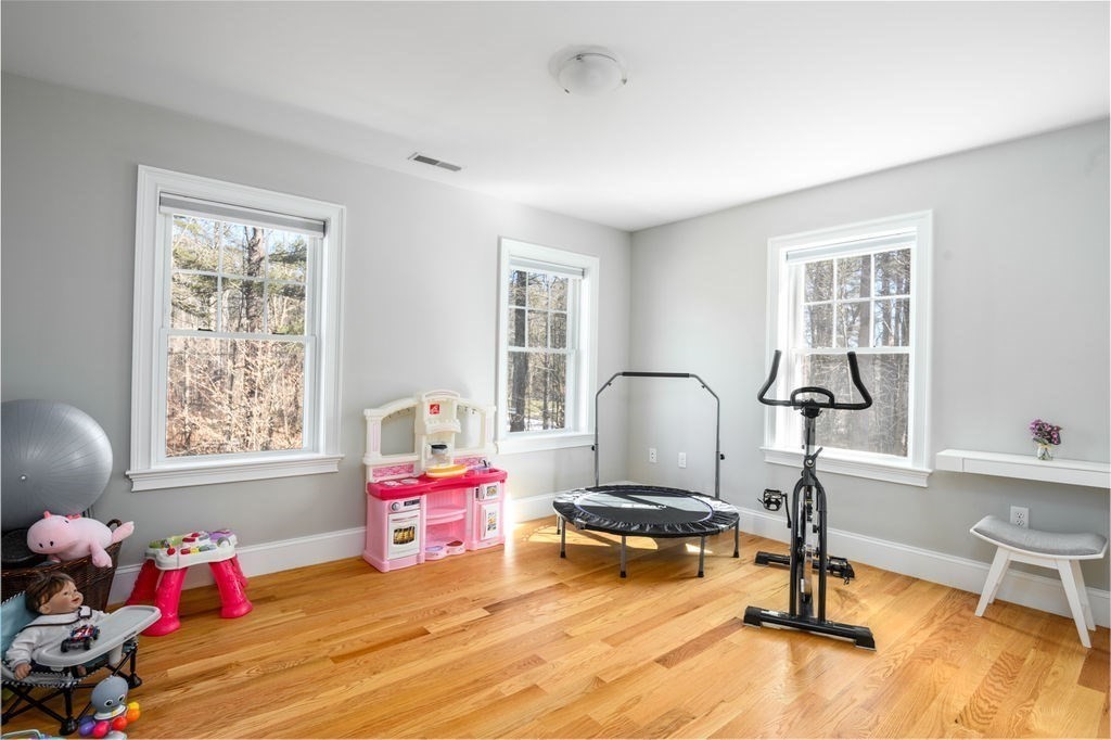 600 Wethersfield Street Rowley, MA 01969 - Photo 36 of 42 a living room with furniture toys and a window
