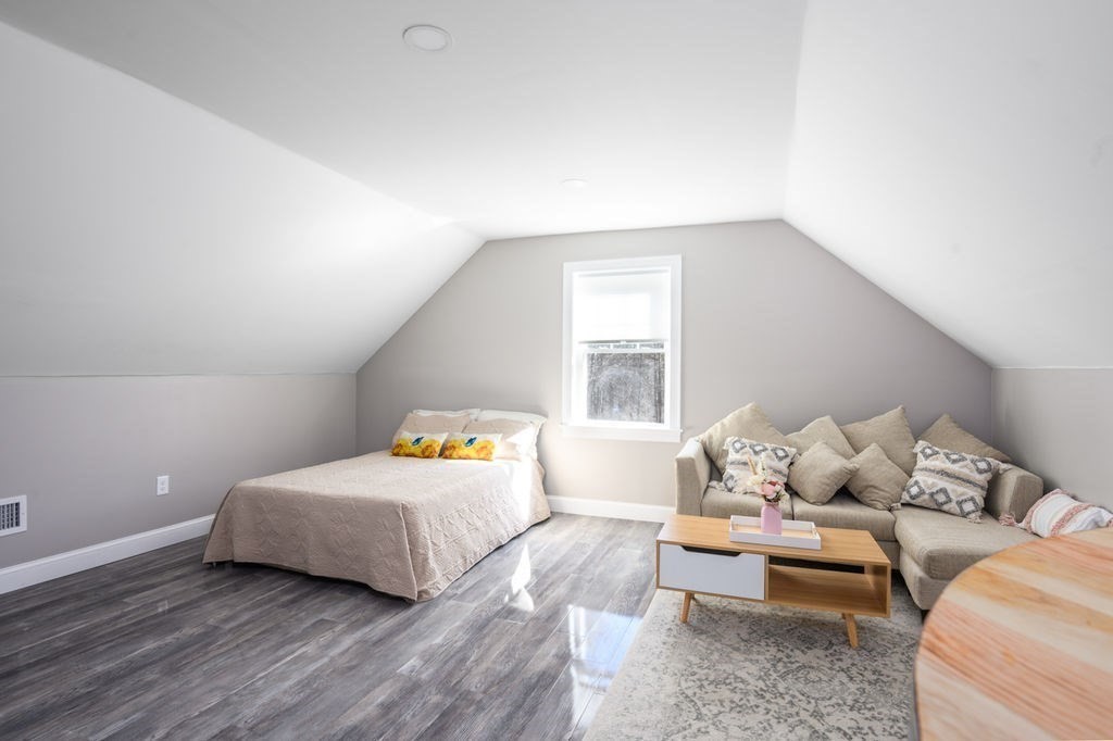 600 Wethersfield Street Rowley, MA 01969 - Photo 38 of 42 a bedroom with a bed and window