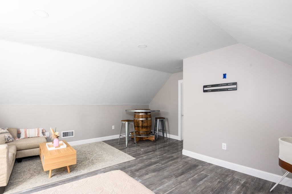 600 Wethersfield Street Rowley, MA 01969 - Photo 39 of 42 a living room with furniture and wooden floor