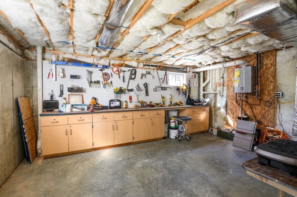 600 Wethersfield Street Rowley, MA 01969 - Photo 41 of 42 a utility room with lot of cabinets