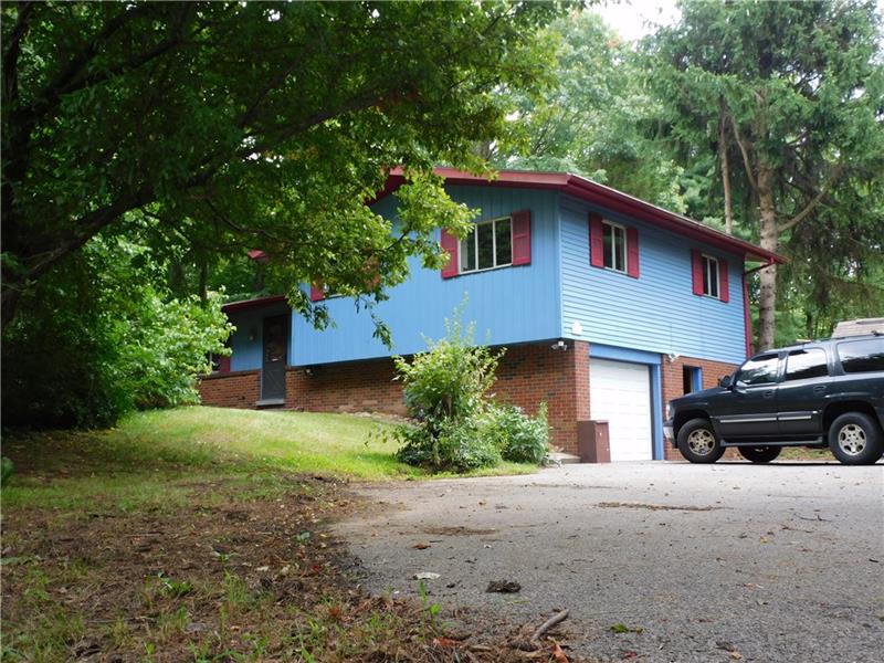 968 Chapel Road Monaca, PA 15061 - Photo 2 of 23 Driveway and integral garage with plenty of space.