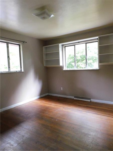 968 Chapel Road Monaca, PA 15061 - Photo 22 of 23 Sun shinning on the hardwood flooring.