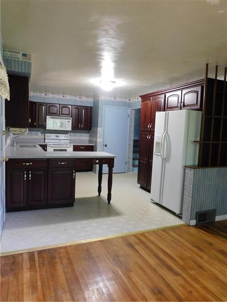968 Chapel Road Monaca, PA 15061 - Photo 8 of 23 A glimpse of the kitchen from the dining room view.