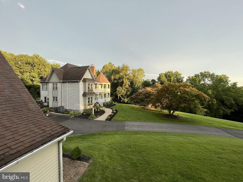 1811 Hatfield Road Huntingtown, MD 20639 - Photo 50 of 50 View of main house from cottage 2nd story porch