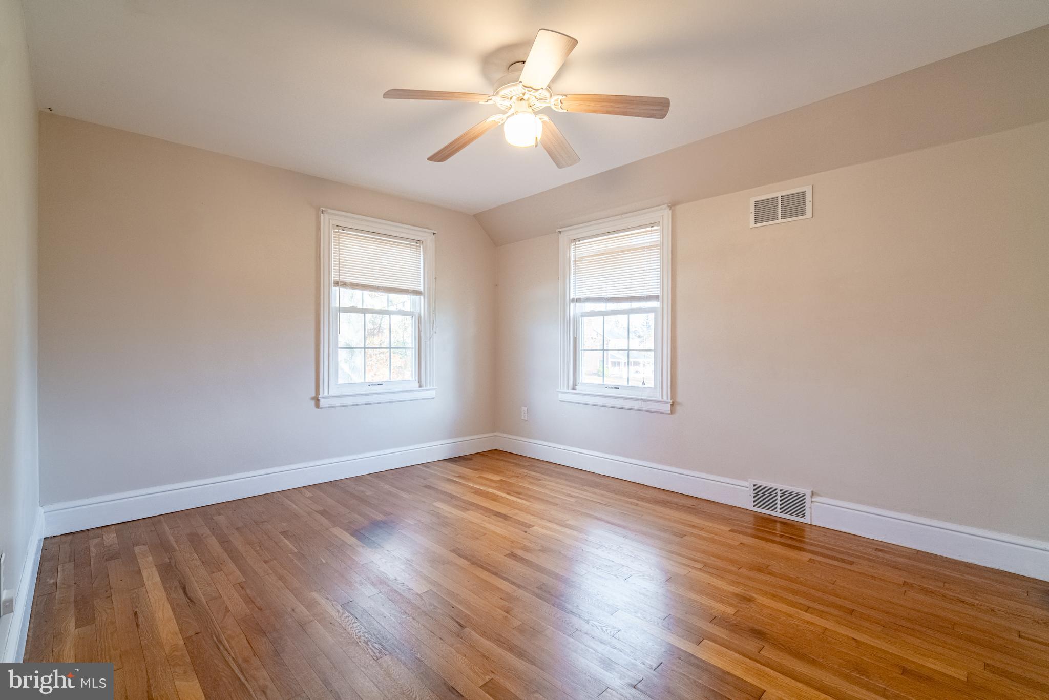 550 East Canal Road York, PA 17404 - Photo 17 of 32 a view of an empty room with window and wooden floor