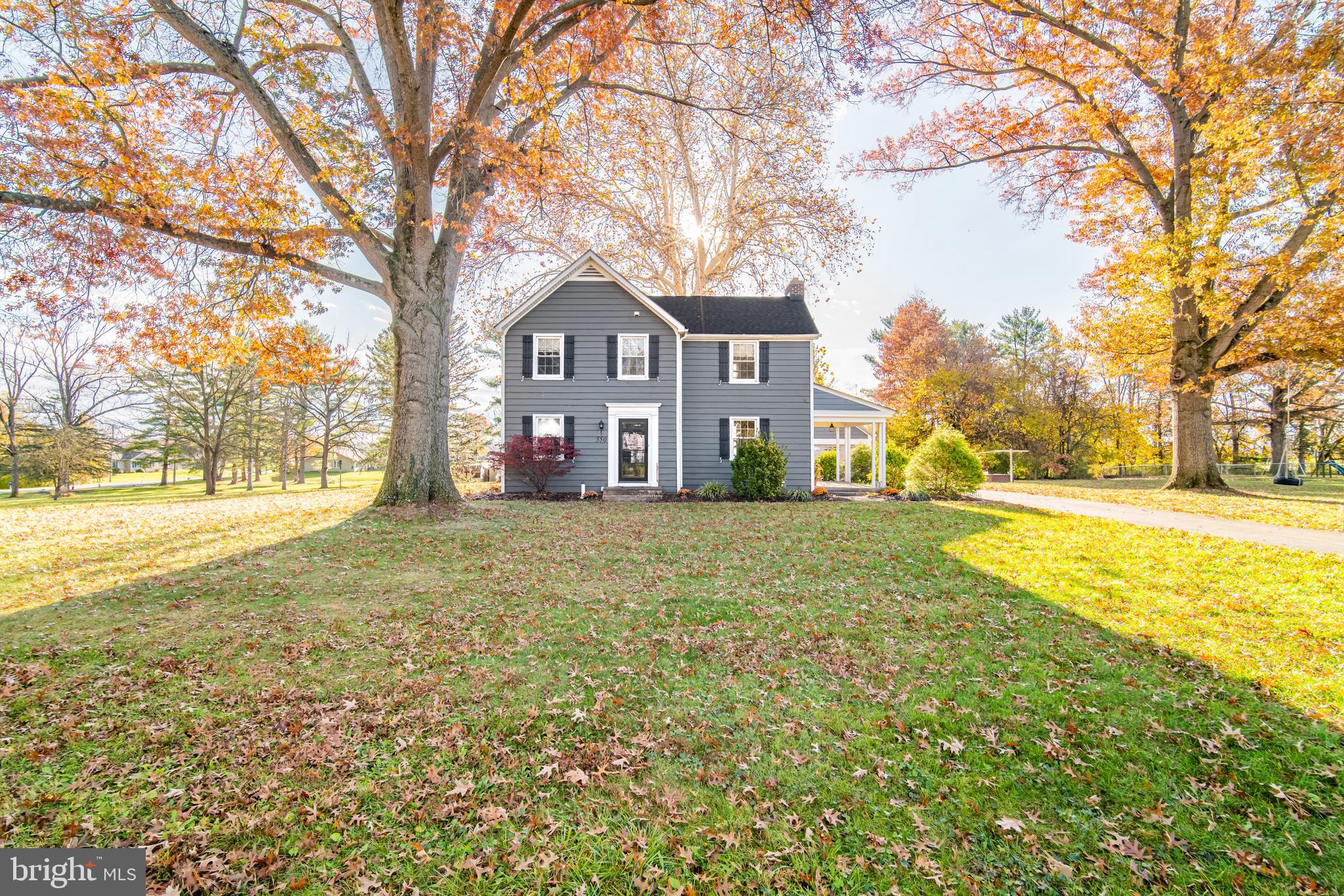 550 East Canal Road York, PA 17404 - Photo 32 of 32 a view of a house with a yard covered with trees