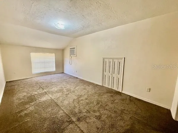 an empty room with a natural light