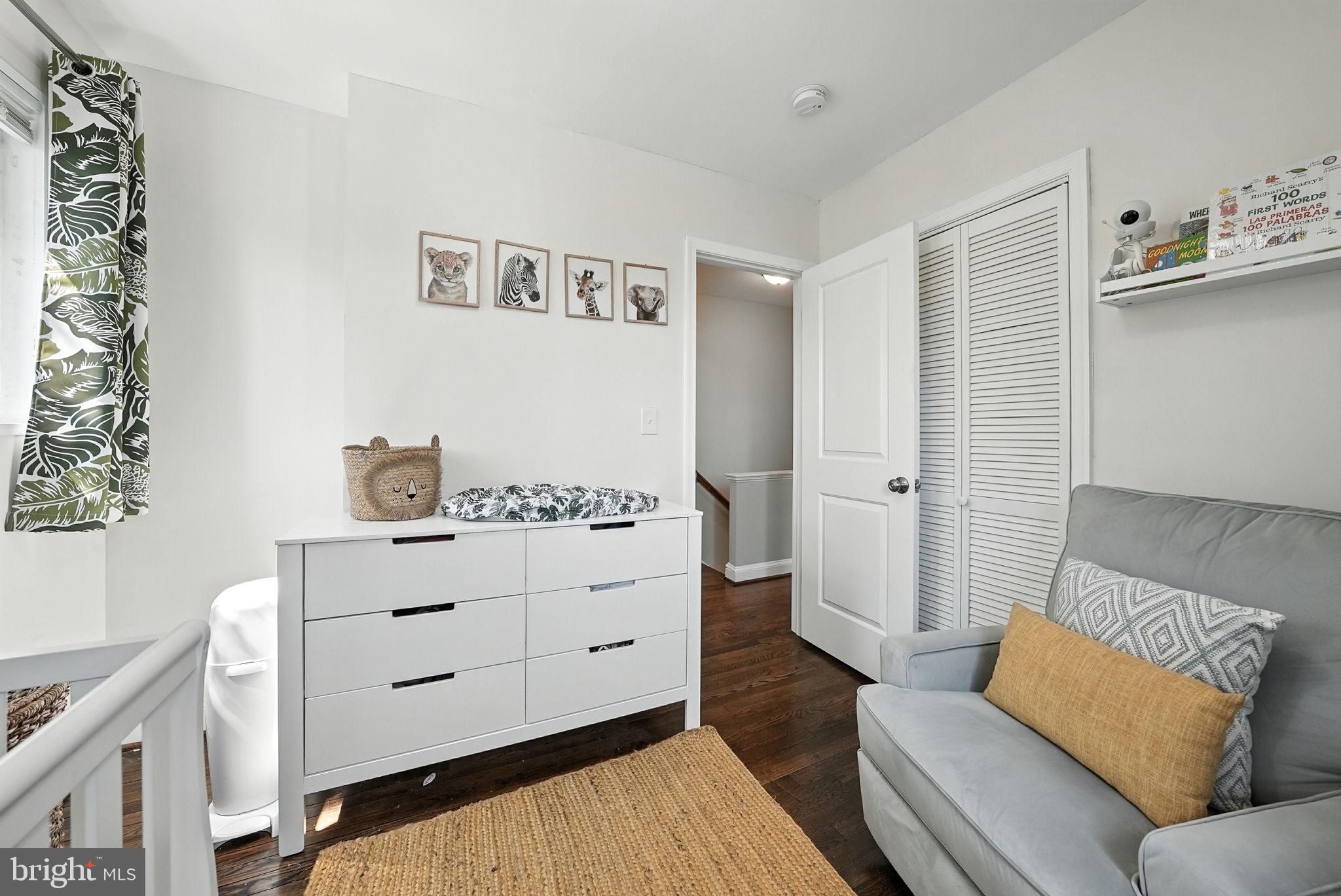 835 Oglethorpe Street Northeast Washington, DC 20011 - Photo 11 of 22 a room with furniture and a couch