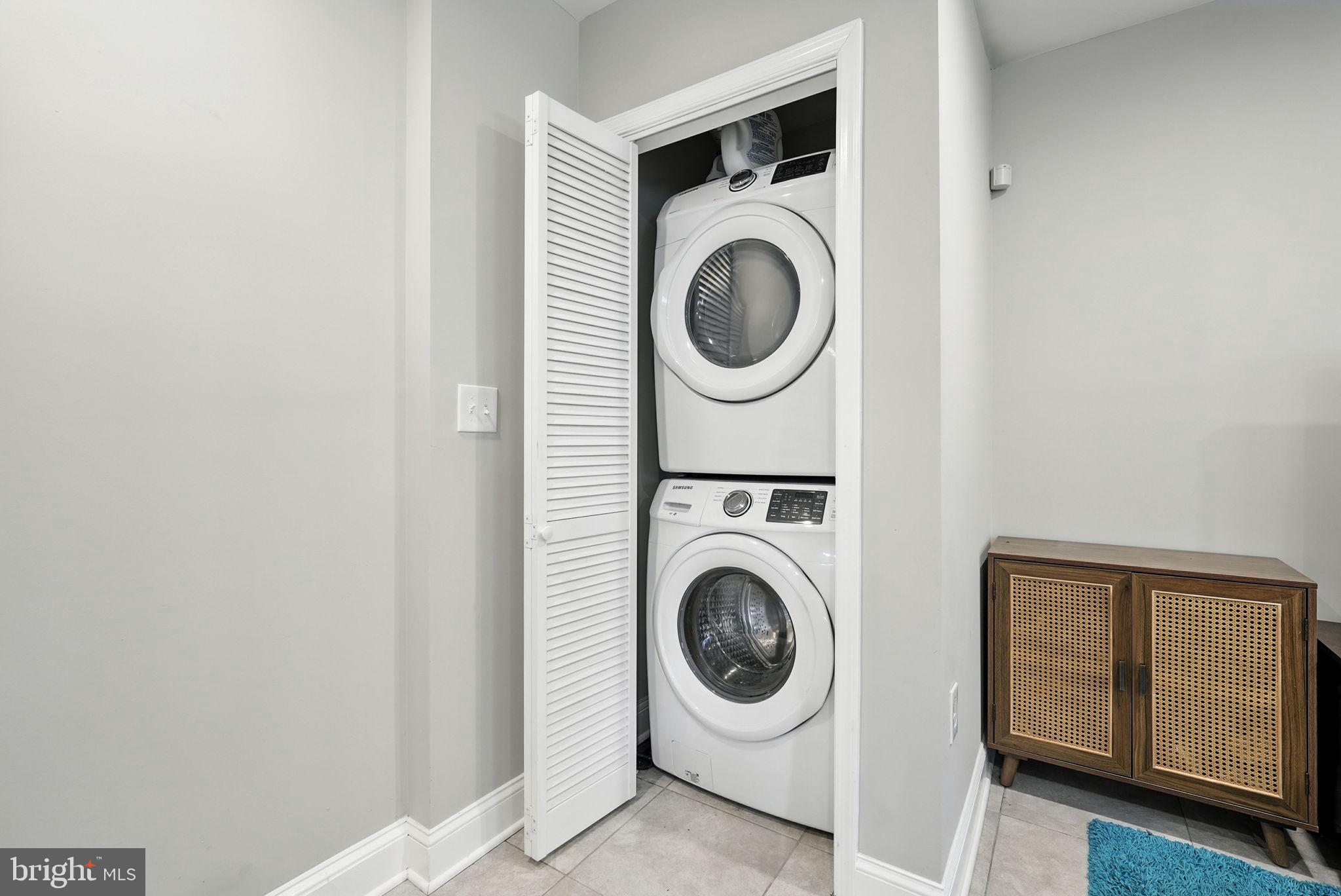 835 Oglethorpe Street Northeast Washington, DC 20011 - Photo 16 of 22 a utility room with dryer and washer
