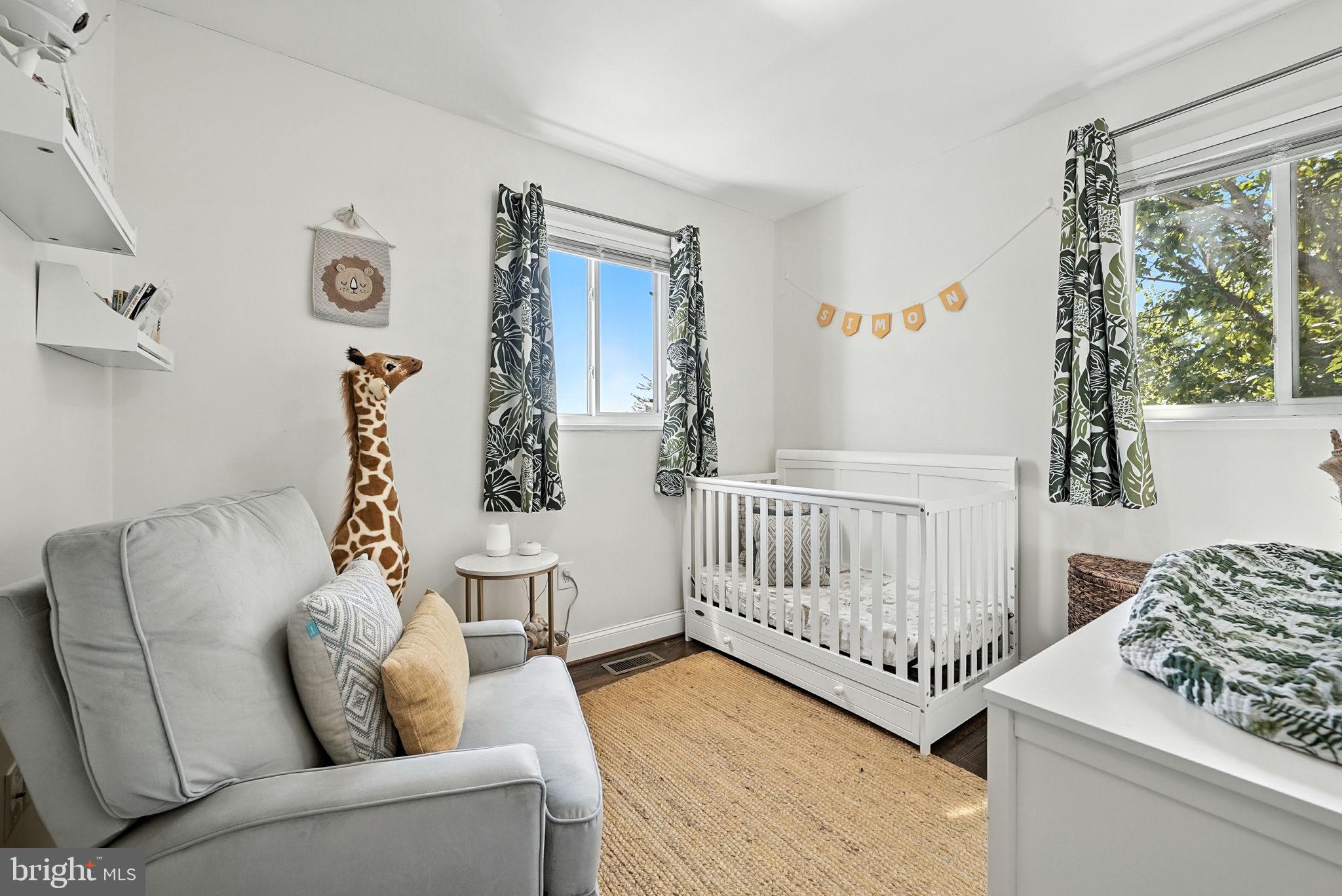 835 Oglethorpe Street Northeast Washington, DC 20011 - Photo 10 of 22 a living room with furniture and a window