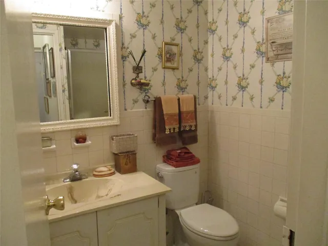 a bathroom with a sink and a toilet