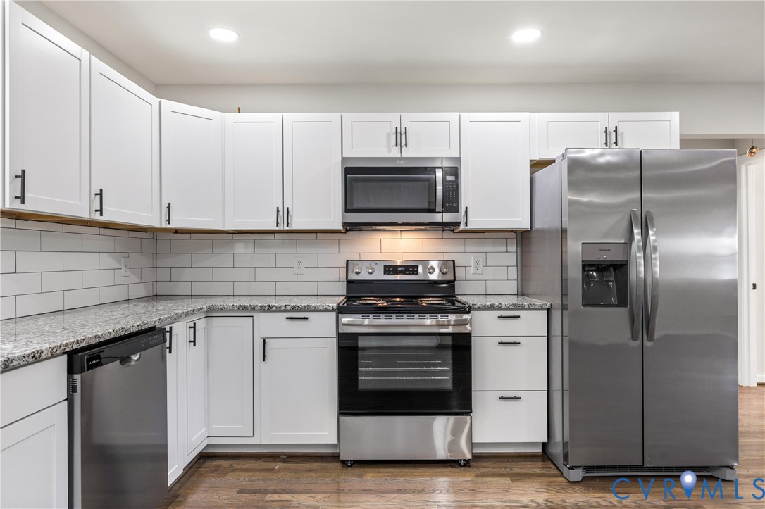 8409 Hopkins Road North Chesterfield, VA 23237 - Photo 17 of 51 White shaker-style cabinetry with black hardware,