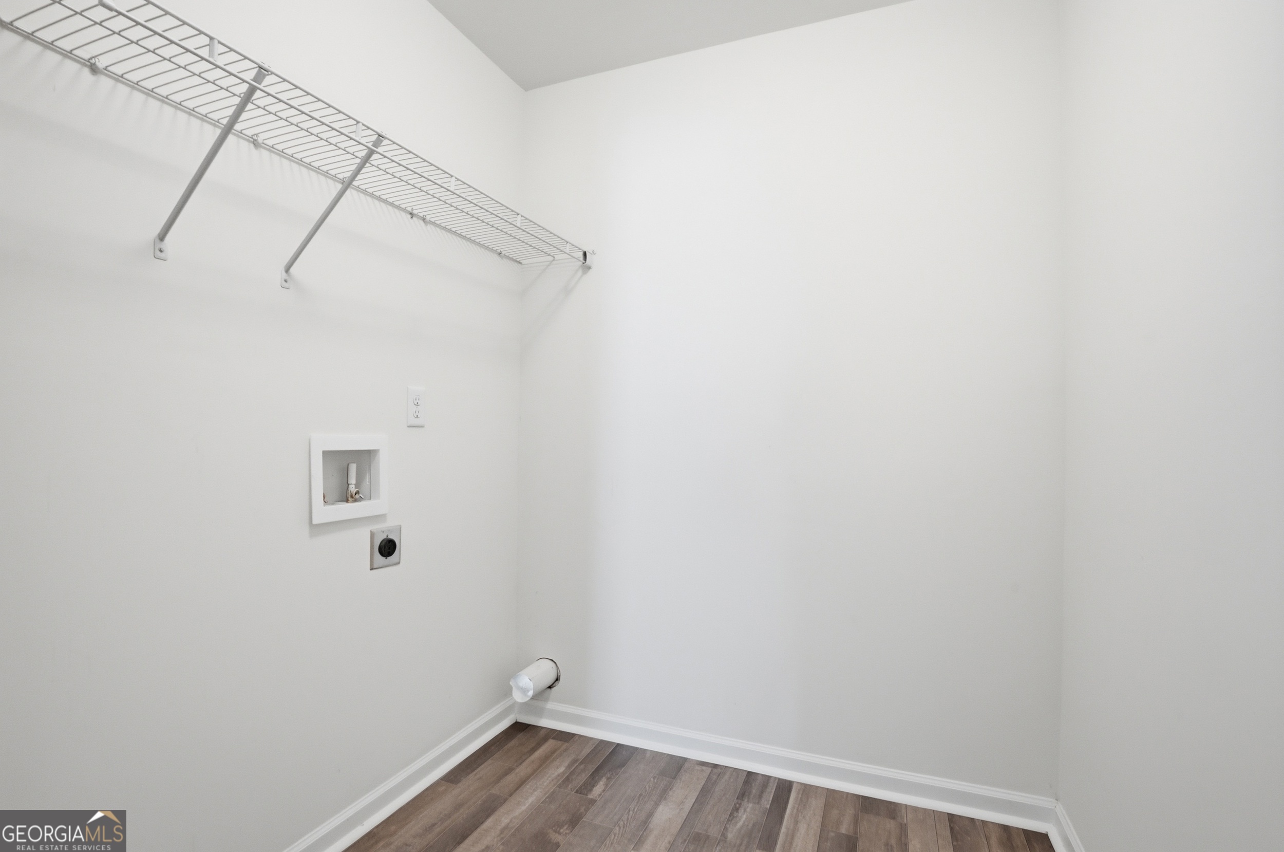 225 Rendell Lane Hinesville, GA 31313 - Photo 19 of 33 a view of a room with racks on the wall