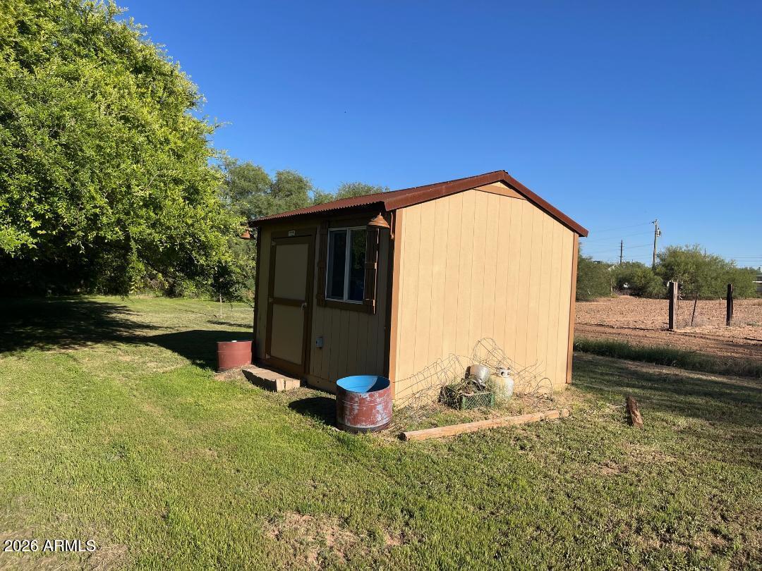 9115 West Broadway Road Tolleson, AZ 85353 - Photo 5 of 13 a view of a backyard