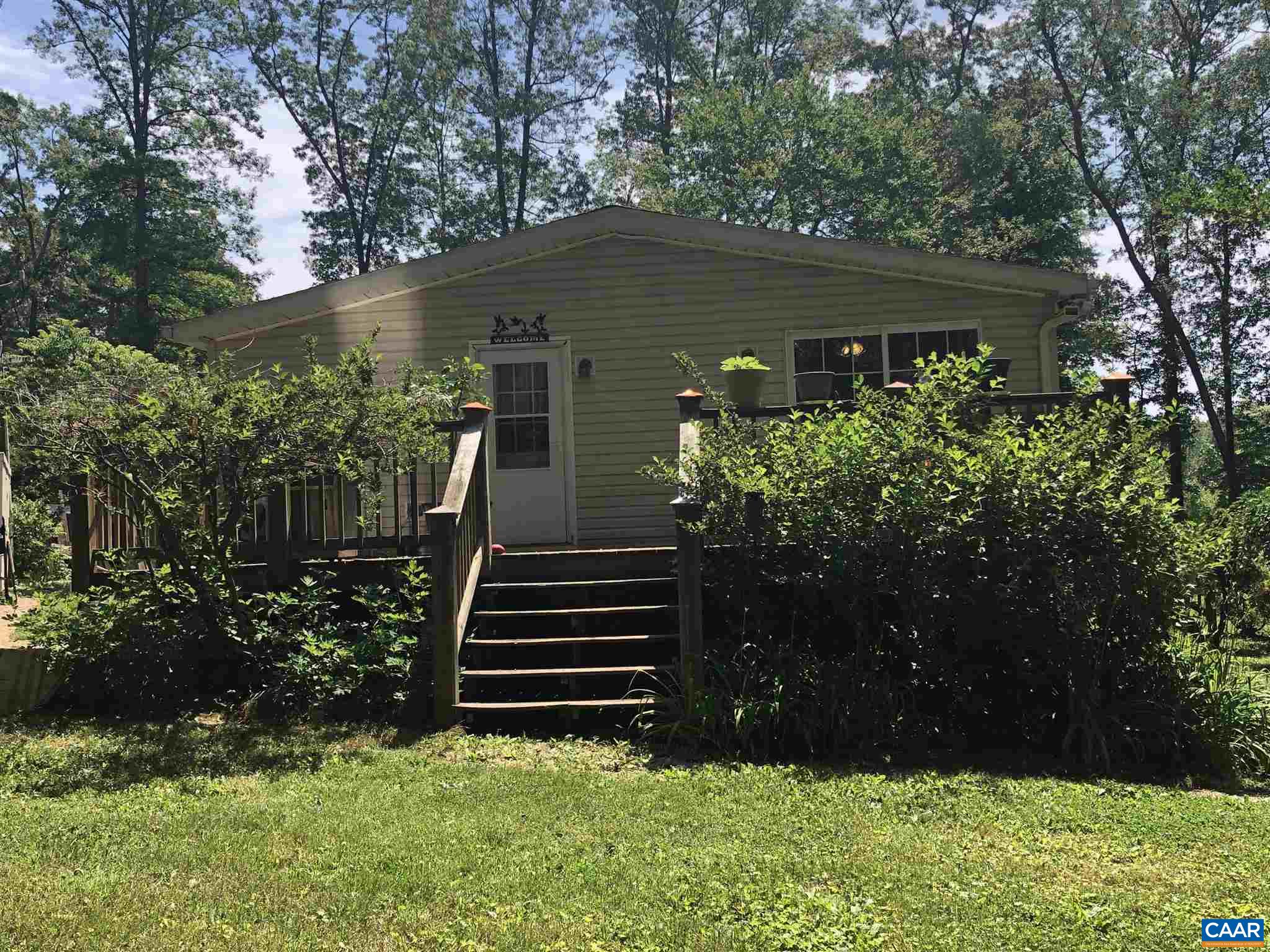 583 Rippin Run Road Ruckersville, VA 22968 - Photo 18 of 28 a view of a house with backyard and garden