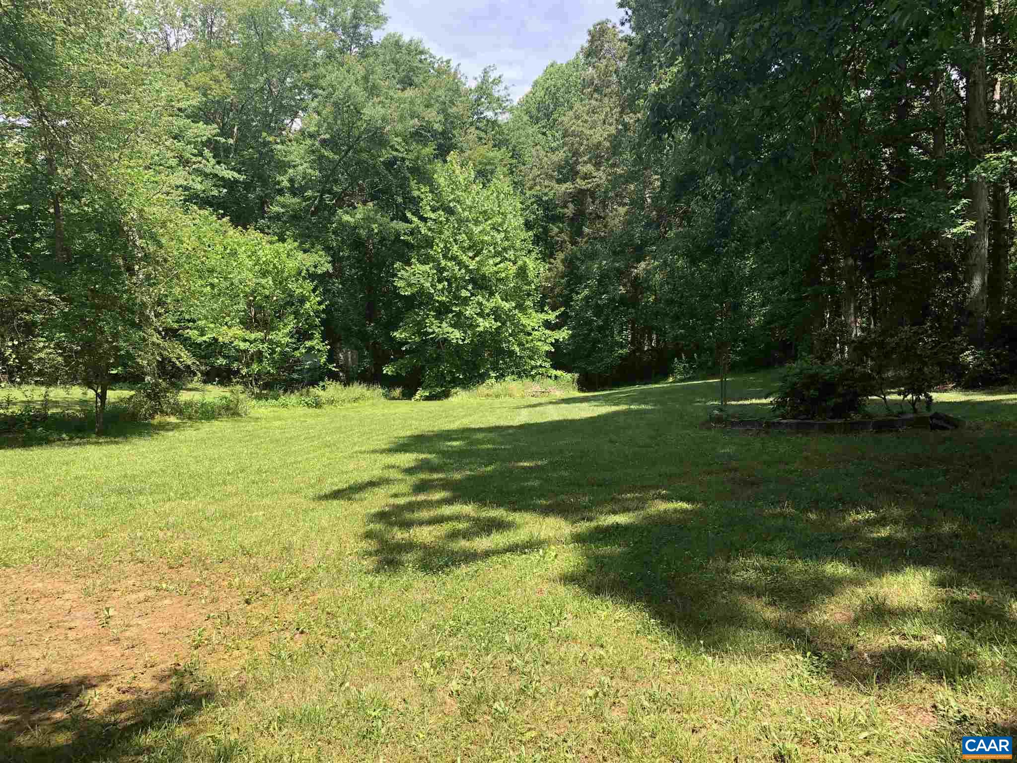 583 Rippin Run Road Ruckersville, VA 22968 - Photo 19 of 28 a view of a big yard with plants and large trees