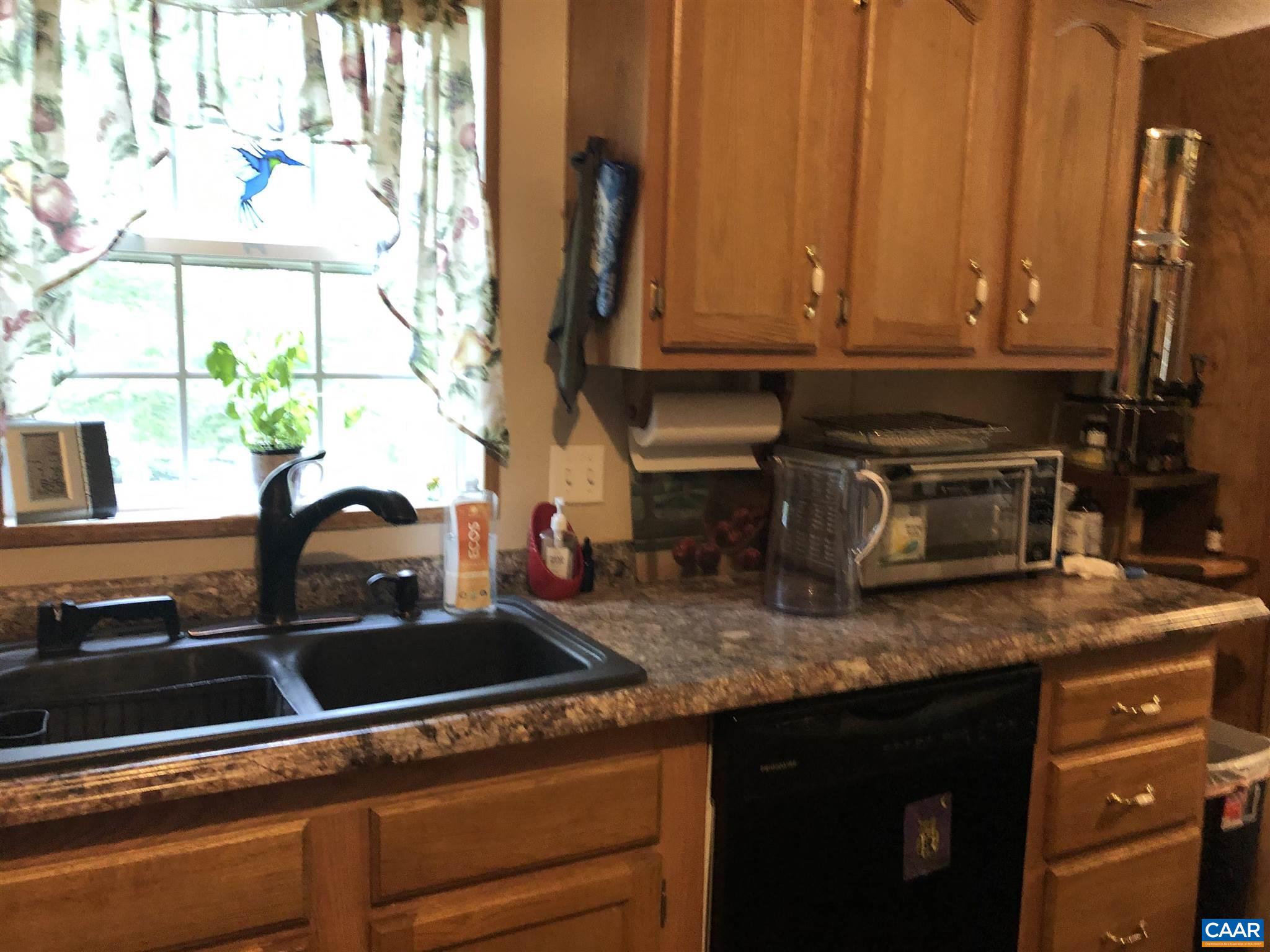 583 Rippin Run Road Ruckersville, VA 22968 - Photo 6 of 28 a kitchen with sink a counter space and a window
