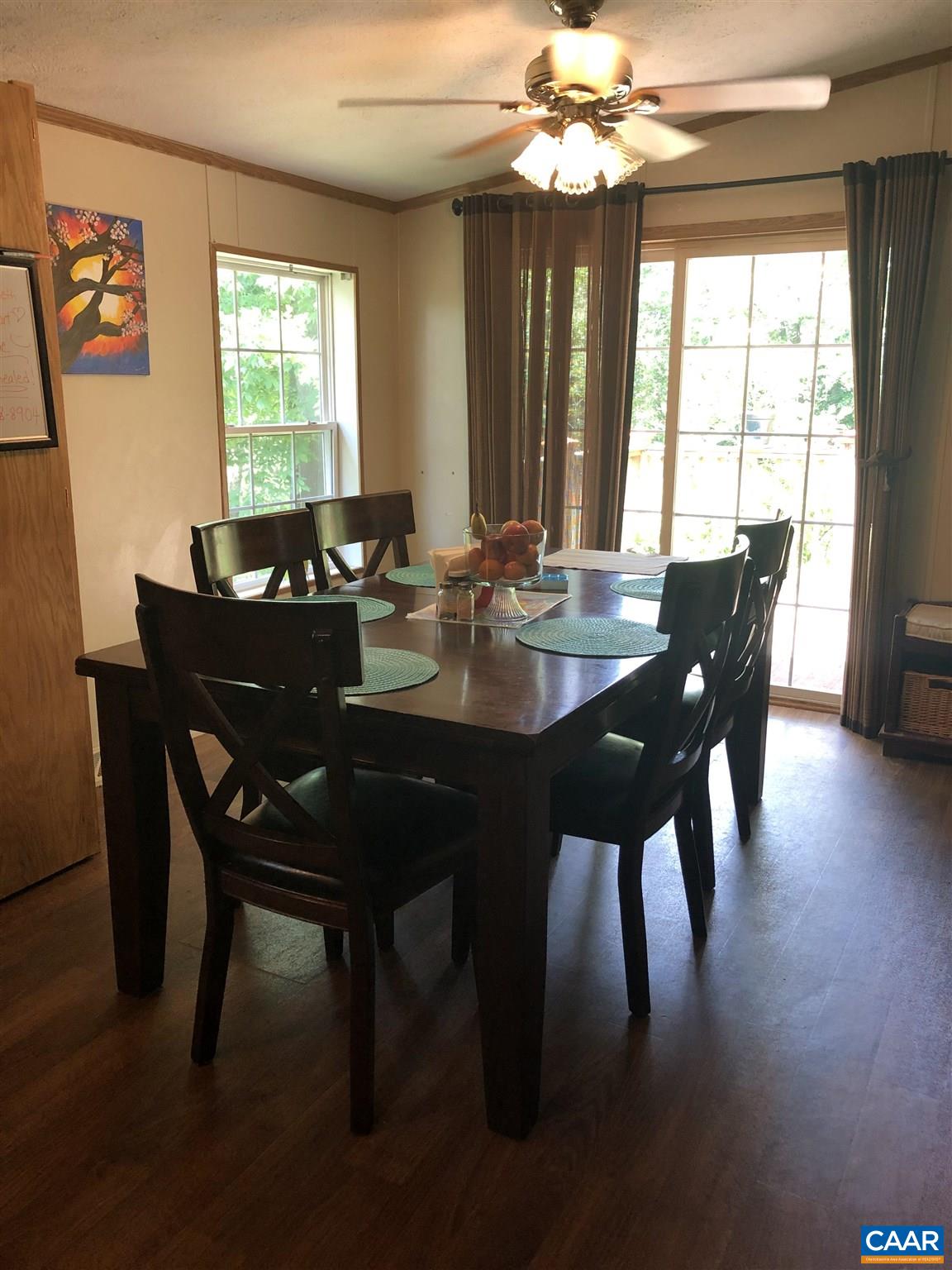 583 Rippin Run Road Ruckersville, VA 22968 - Photo 7 of 28 a view of a dining room with furniture window and outside view