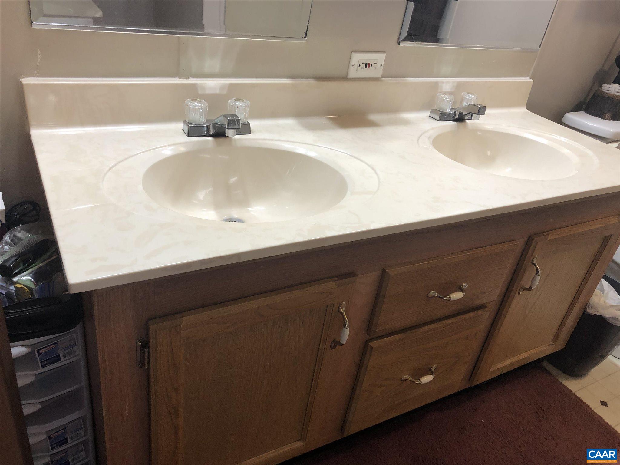 583 Rippin Run Road Ruckersville, VA 22968 - Photo 9 of 28 a bathroom with a sink and a mirror