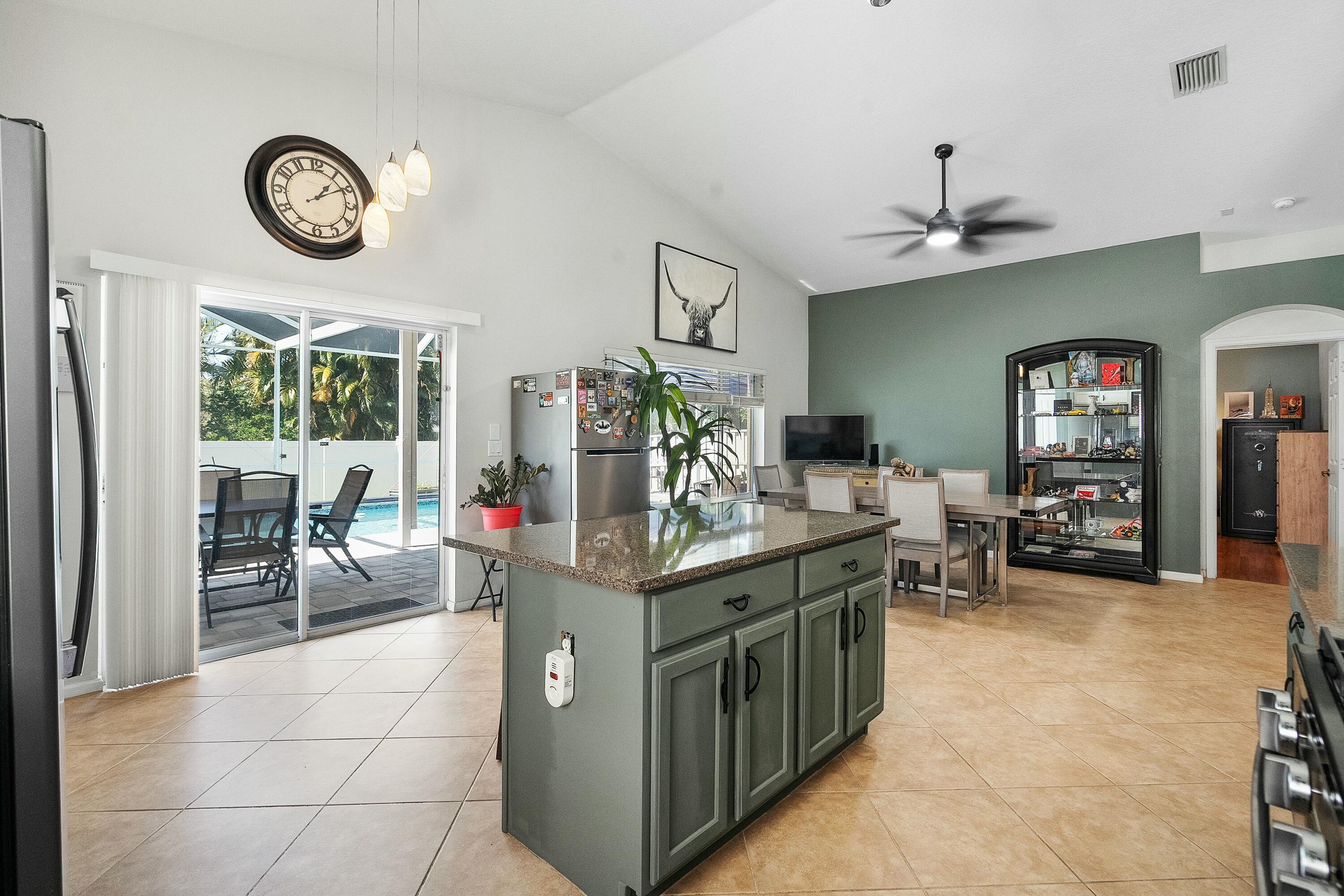 2480 Southeast Springtree Place Stuart, FL 34997 - Photo 11 of 39 a view of kitchen with sink and refrigerator