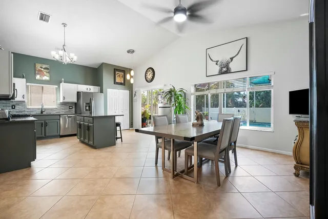 a view of a dining room with furniture