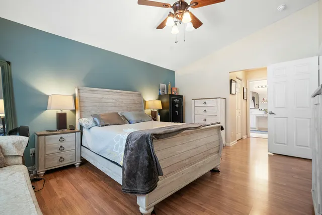 a bedroom with bed and window