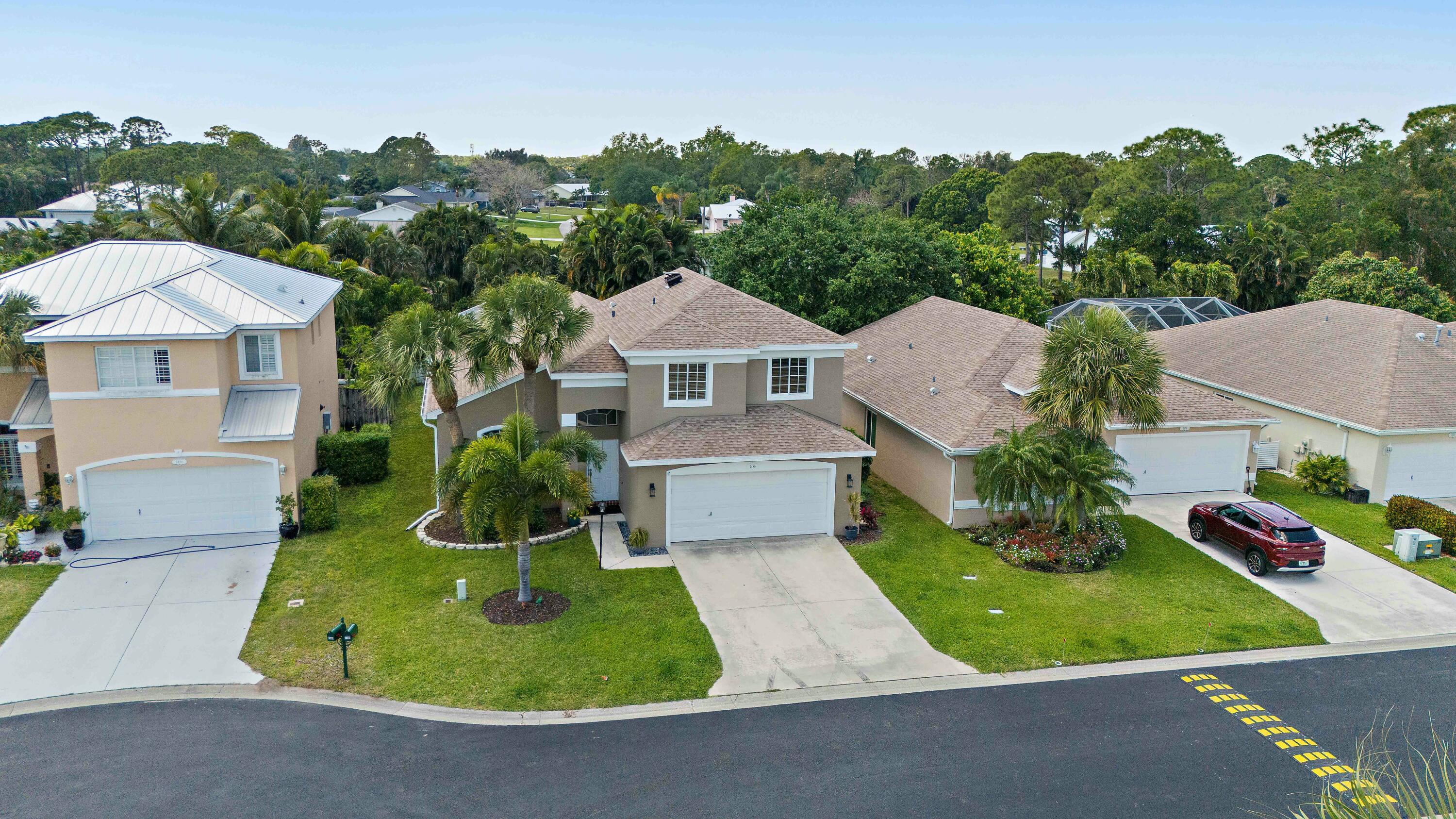 2480 Southeast Springtree Place Stuart, FL 34997 - Photo 37 of 39 an aerial view of a house