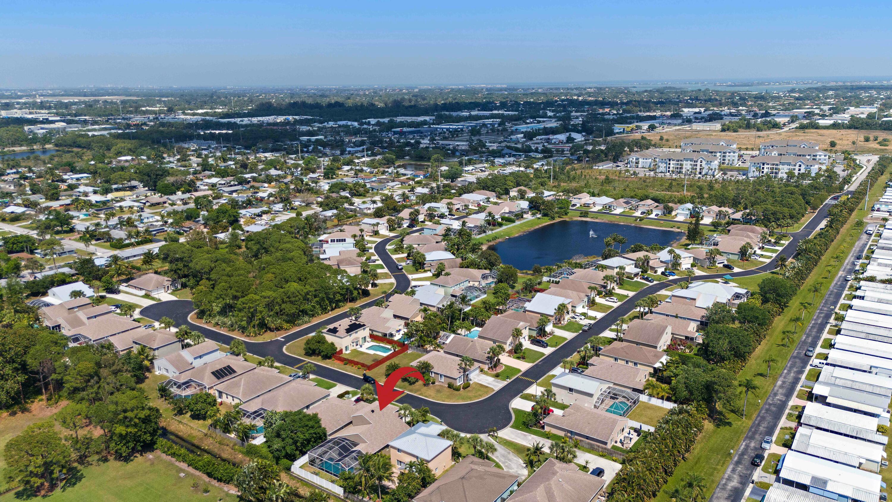 2480 Southeast Springtree Place Stuart, FL 34997 - Photo 39 of 39 an aerial view of residential building and lake