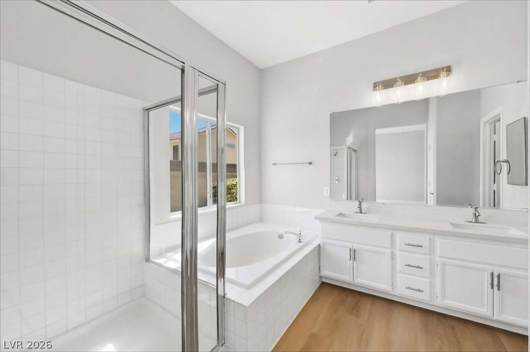 1906 Cardinal Point Street Henderson, NV 89012 - Photo 15 of 20 Clean lines and a spacious dual vanity define this modern bathroom.