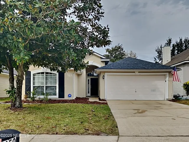 front view of house with a yard