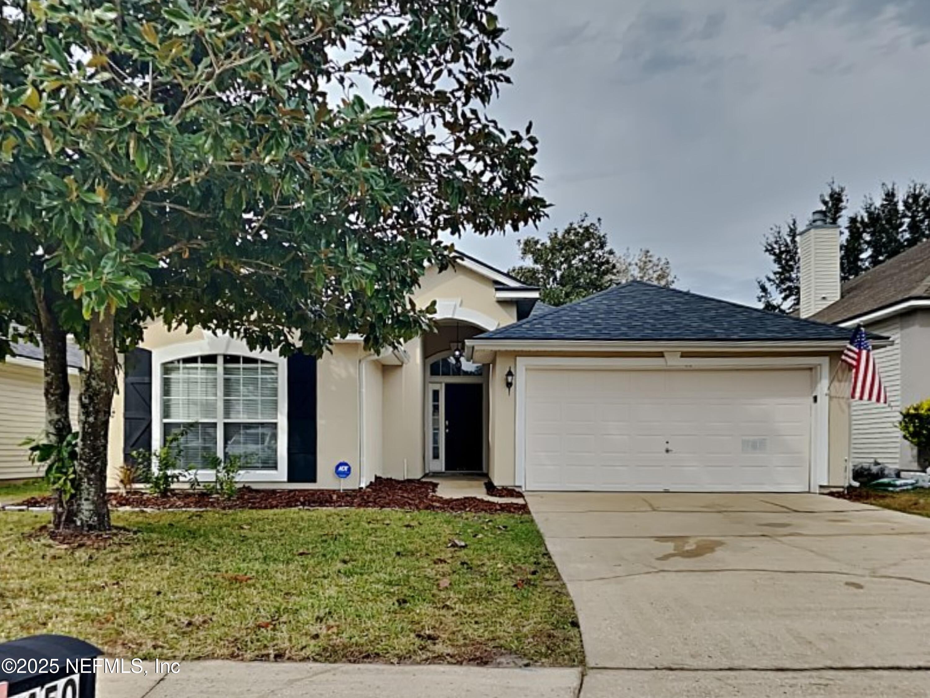 front view of house with a yard