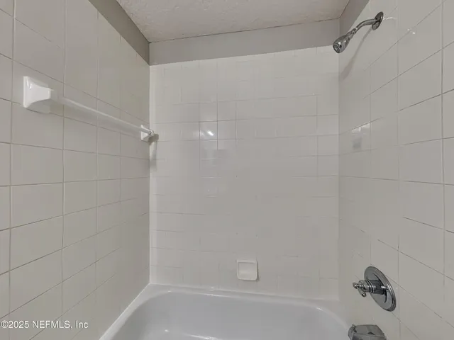 a bathroom with a bathtub