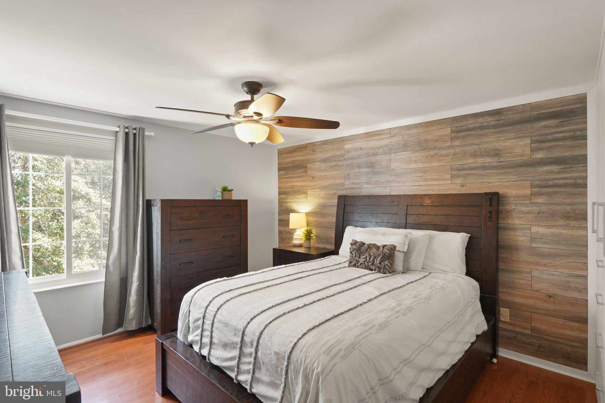 8282 Morning Dew Court Springfield, VA 22153 - Photo 26 of 63 a bedroom with a large bed and a window