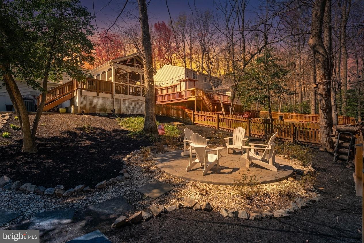 8282 Morning Dew Court Springfield, VA 22153 - Photo 4 of 63 patio/firepit area. fenced in yard