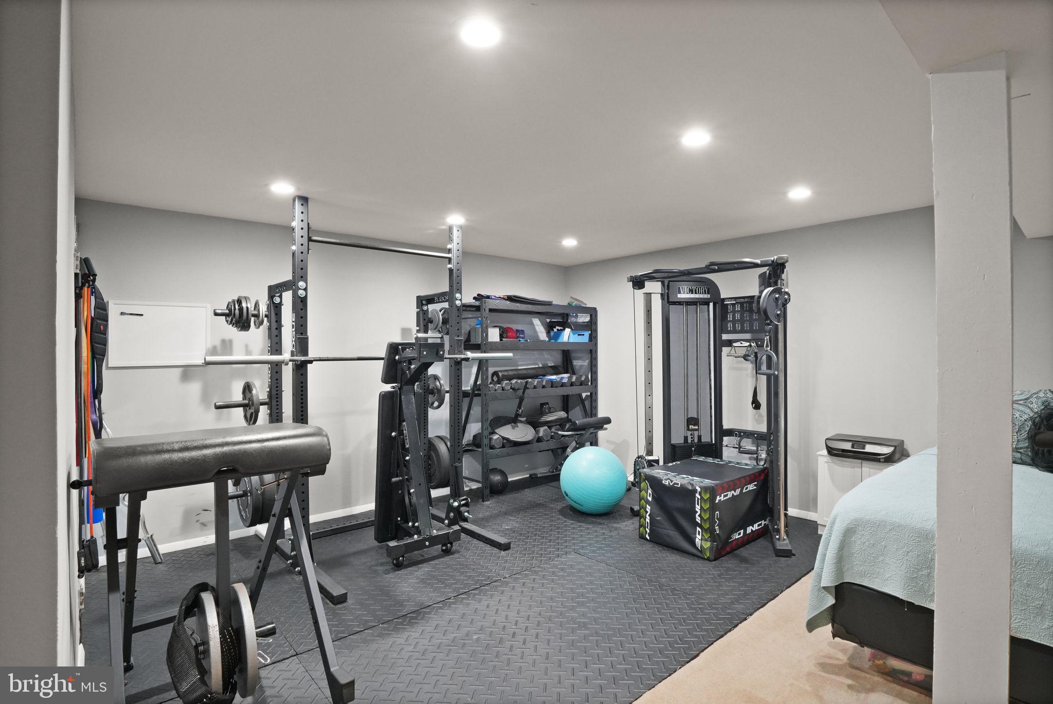 8282 Morning Dew Court Springfield, VA 22153 - Photo 41 of 63 a view of a room with gym equipment