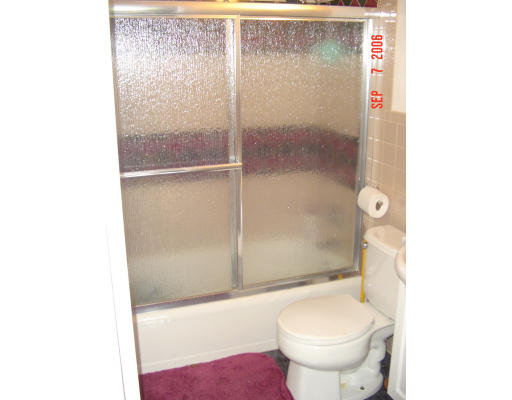 62 Prescott Road Concord, MA 01742 - Photo 18 of 25 a bathroom with a toilet and a shower