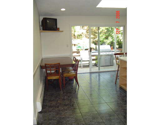 62 Prescott Road Concord, MA 01742 - Photo 4 of 25 a dining room with furniture and a floor to ceiling window