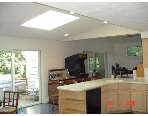 62 Prescott Road Concord, MA 01742 - Photo 5 of 25 a kitchen with a sink cabinets and wooden floor