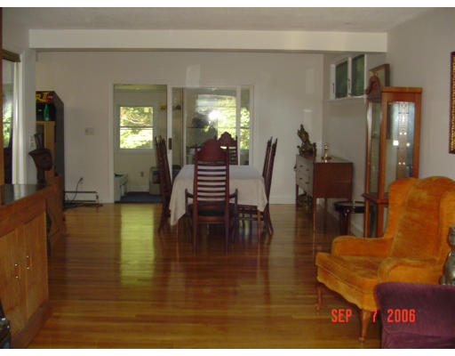62 Prescott Road Concord, MA 01742 - Photo 6 of 25 a living room with fireplace furniture and a wooden floor