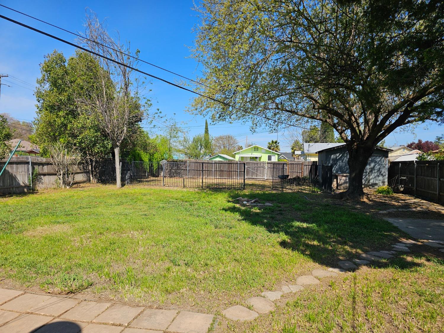 1140 Locust Street Gridley, CA 95948 - Photo 21 of 22 a view of a yard with a house