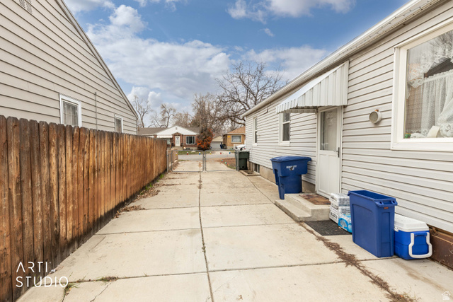 875 Patterson Street Ogden, UT 84403 - Photo 28 of 38 View of side of home with a patio area
