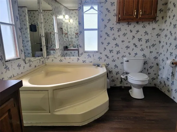 a bathroom with a sink and a toilet