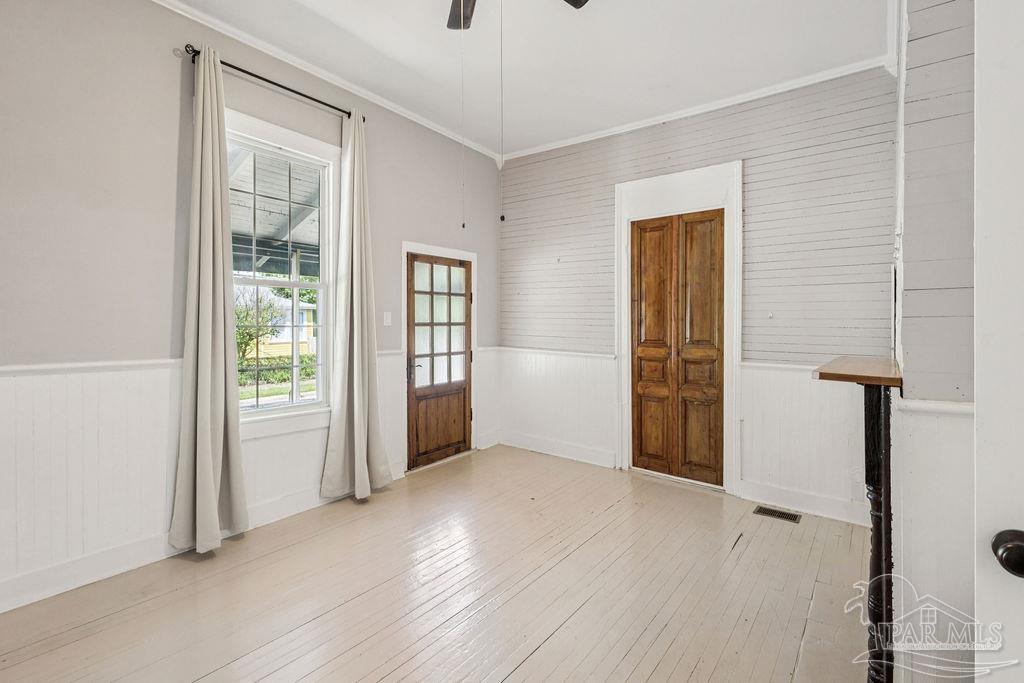 600 East Jackson Street Pensacola, FL 32501 - Photo 11 of 45 an empty room with windows